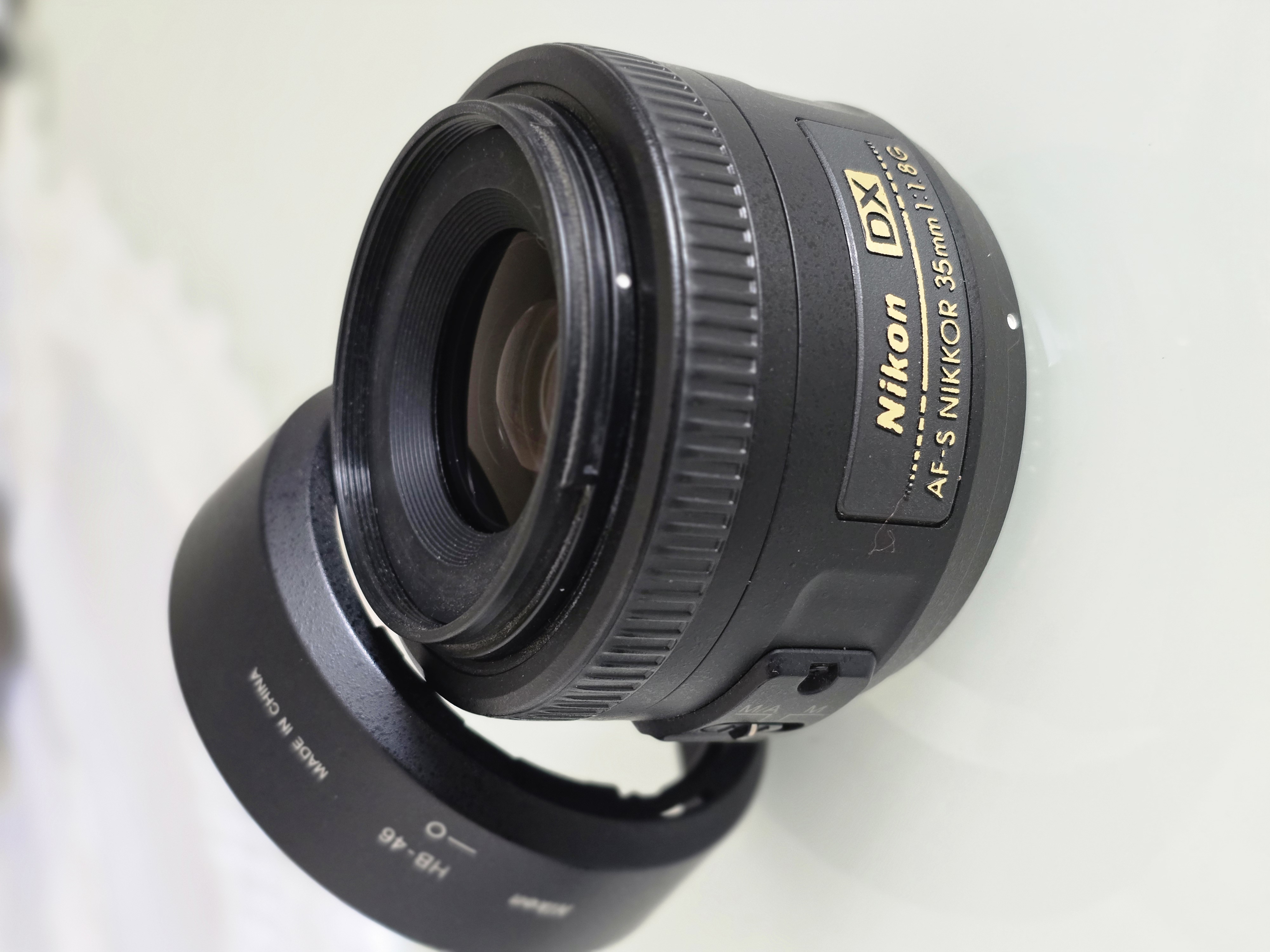 Lente Nikon Seminova 35mm Af-s 1.8 G Dx Motor Foco